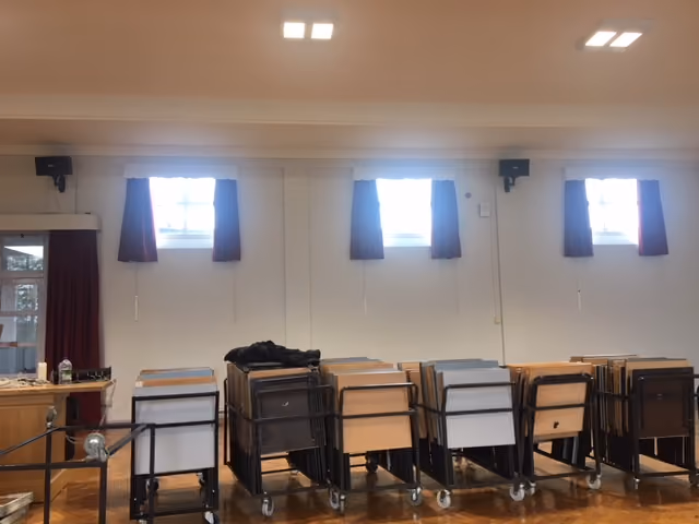 photo of curtains in windows in school hall