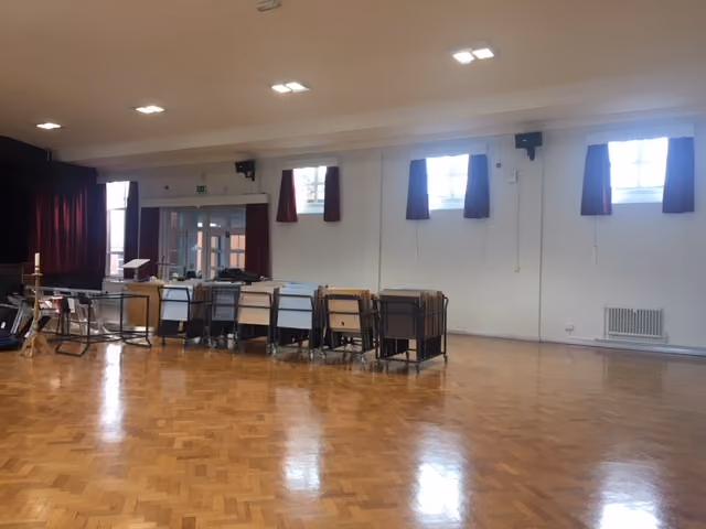 photo of curtains in windows in school hall